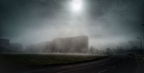 Road in city against sky