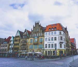 Buildings in city against sky