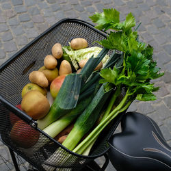 High angle view of fruits in basket on table