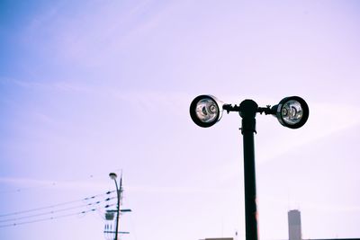 Low angle view of flood light against clear sky