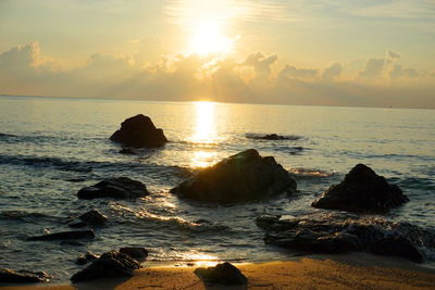 Scenic view of sea against sky during sunset