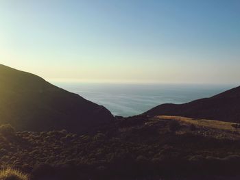 Scenic view of mountains against clear sky