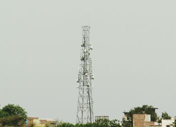 Low angle view of communications tower against clear sky