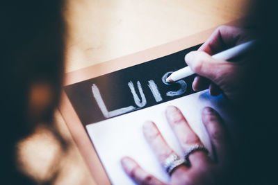 Close-up of woman using mobile phone