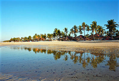 View of calm sea against clear blue sky