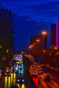 Traffic on city street at night