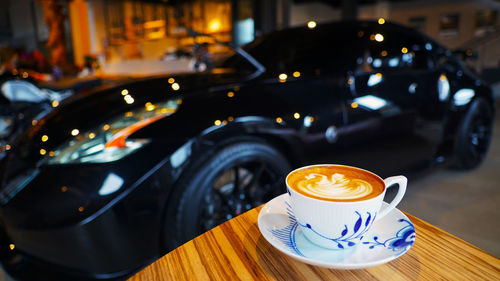 Close-up of coffee served on table