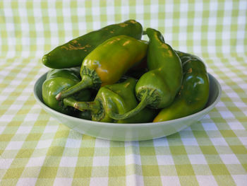 Close-up of bell peppers in plate on table