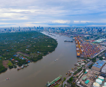 High angle view of buildings in city against sky