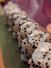 Close-up of sushies on table