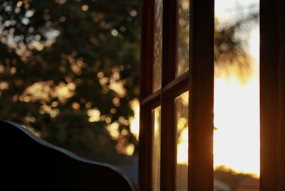 Sunset view through a bedroom window