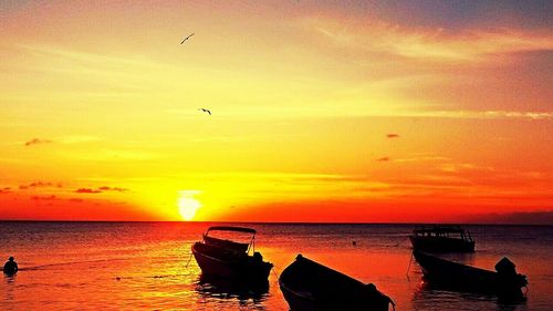 Scenic view of sea at sunset