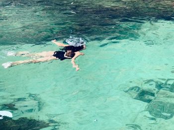 High angle view of woman swimming