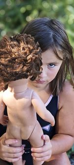 Portrait of smiling young woman with long hair