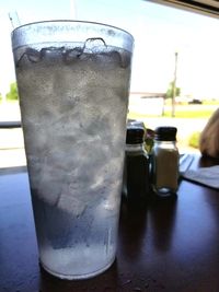 Close-up of beer glass on table