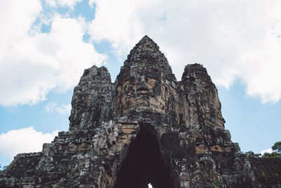 Low angle view of old temple against sky