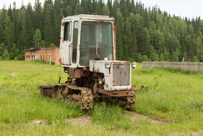 Abandoned train on field