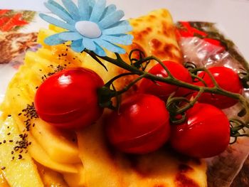 High angle view of cherries in plate