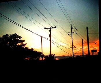 Electricity pylon at sunset