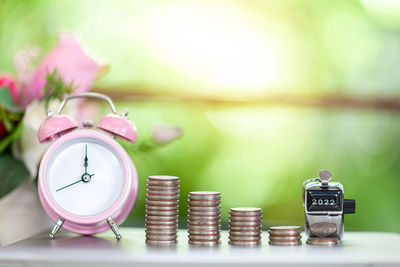 Close-up of coins on table