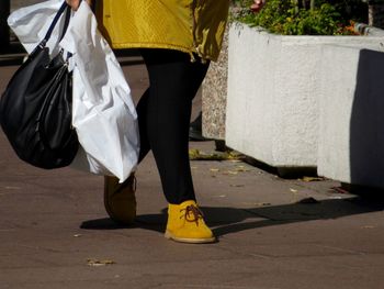 Low section of woman standing on floor