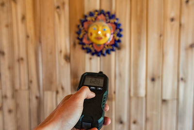 Close-up of man using mobile phone