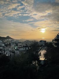 High angle view of townscape against sky at sunset