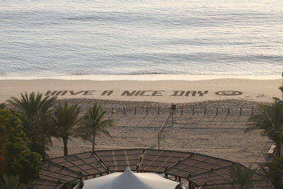 Close-up of text on beach