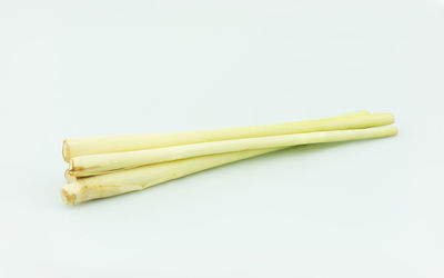 High angle view of bread against white background