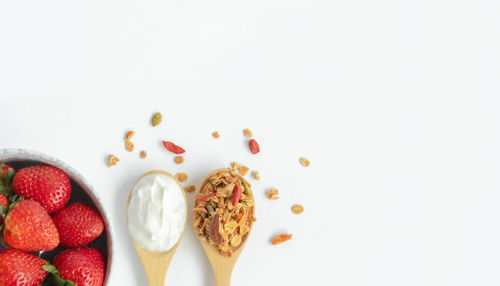 Directly above shot of breakfast on white background