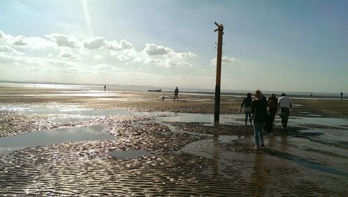 Silhouette of people on beach