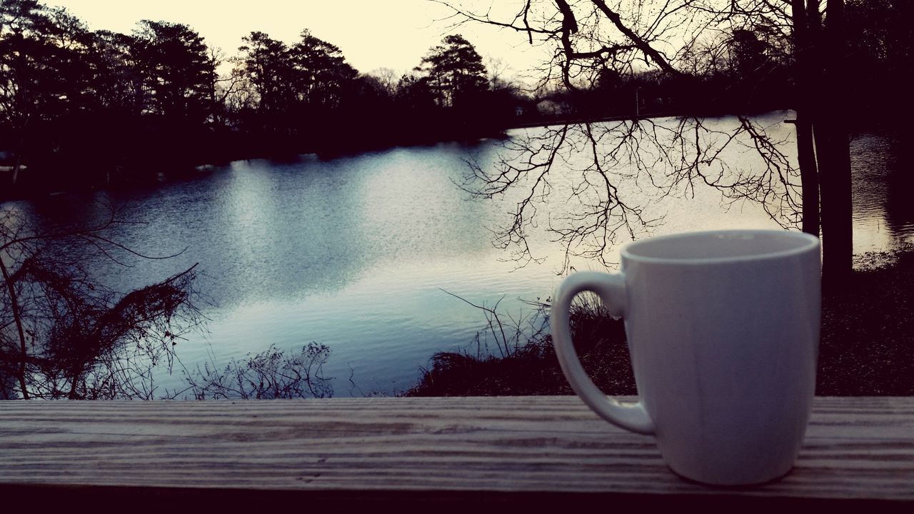 tree, water, table, reflection, lake, tranquility, tranquil scene, drink, absence, sky, nature, empty, chair, no people, scenics, beauty in nature, boat, refreshment, outdoors, sunset