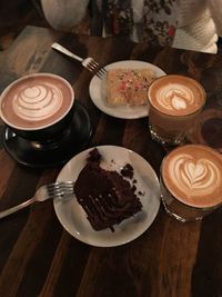 Close-up of cappuccino served on table