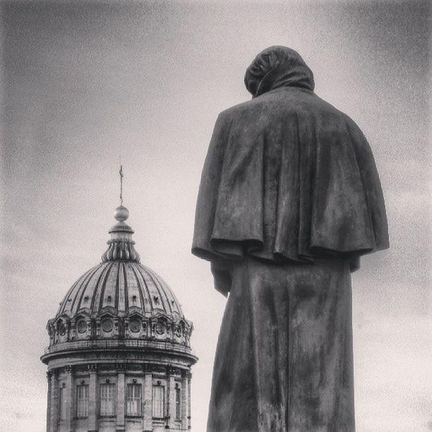 statue, human representation, sculpture, religion, art and craft, spirituality, low angle view, art, architecture, built structure, place of worship, creativity, building exterior, dome, sky, famous place, travel destinations