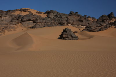 Scenic view of desert against sky