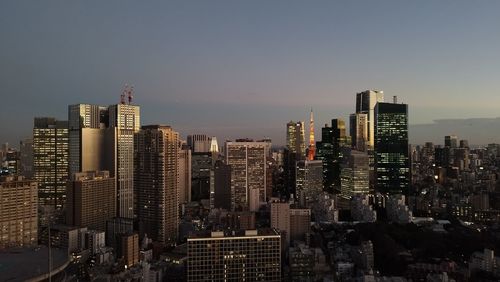 Modern buildings in city against sky