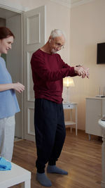 Senior man exercising at nursing home