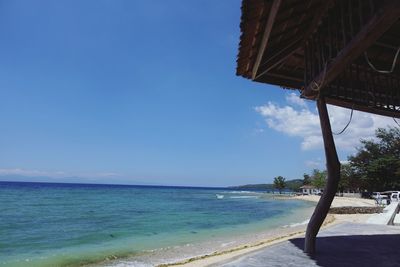 Scenic view of sea against blue sky