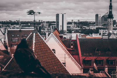 High angle view of buildings in city against sky