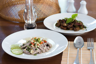 Close-up of food served on table