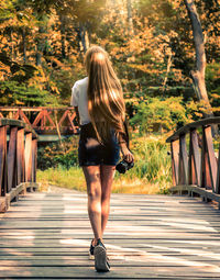 Full length rear view of woman