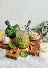 Fresh made pesto sauce. green basil pesto. ingredient for pesto sauce 