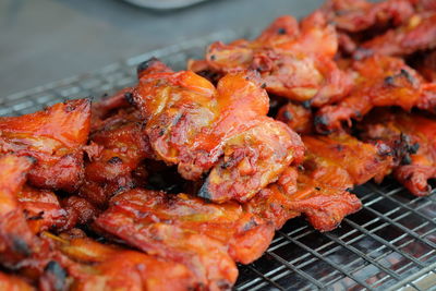 Close-up of meat on barbecue grill