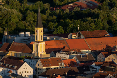 High angle view of houses and trees in town