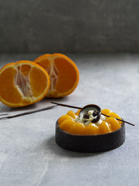 Close-up of orange slice on table