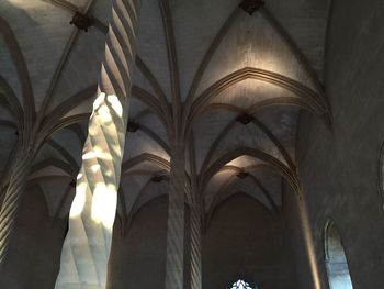 Low angle view of cross on building