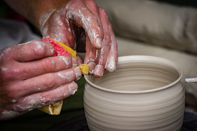 Close-up of hand holding ice cream