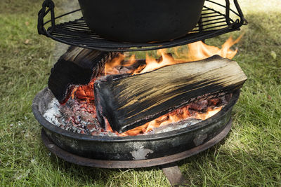 Close-up of meat on barbecue grill