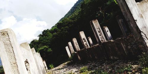 Low angle view of old ruin against sky