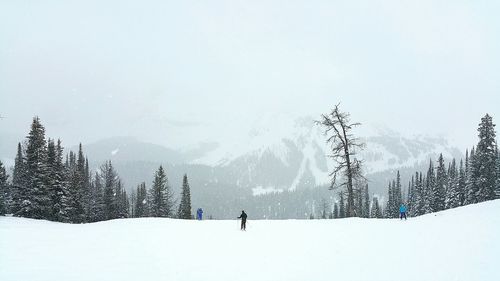 Scenic view of snow covered mountains